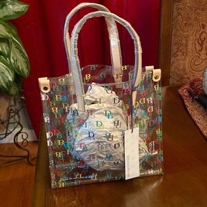New with tags Small DOONEY & BOURKE clear tote multi-color. Authentic